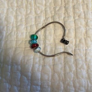 Assorted Chamilia beads and charm bracelet